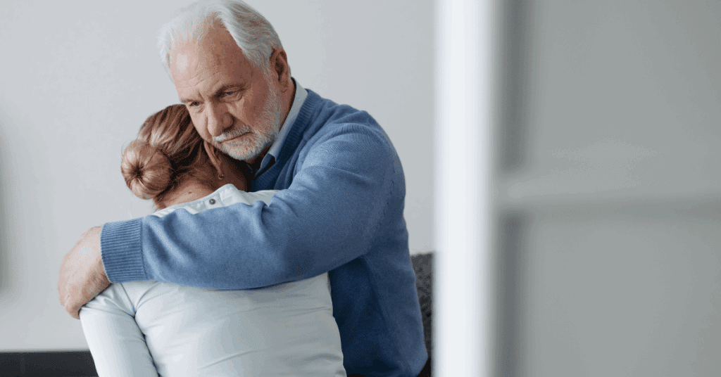 a senior couple hugging