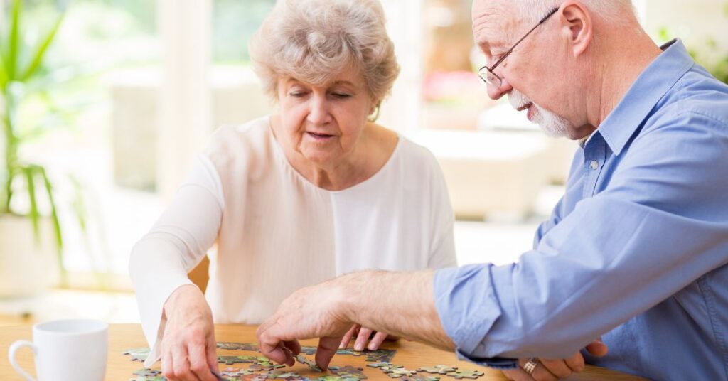 seniors doing a puzzle