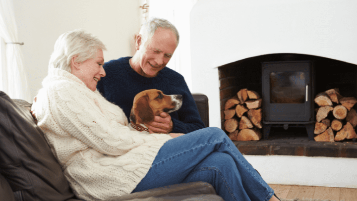 A senior couple with a dog