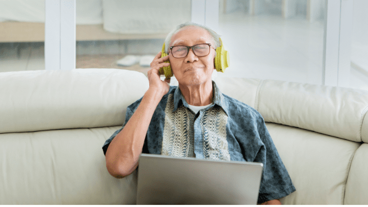 an old man listening to music