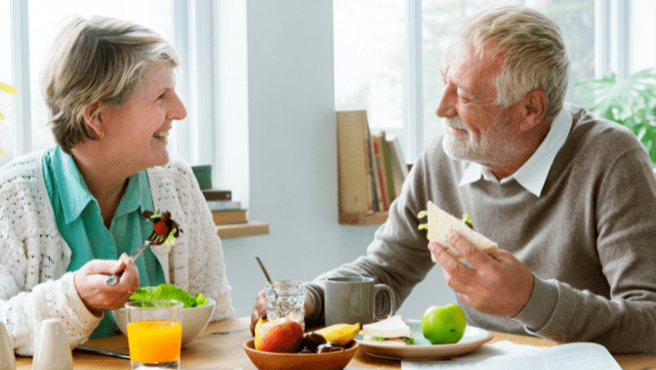 elderly sharing meals together