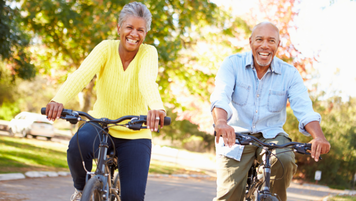 a senior couple riding bikes