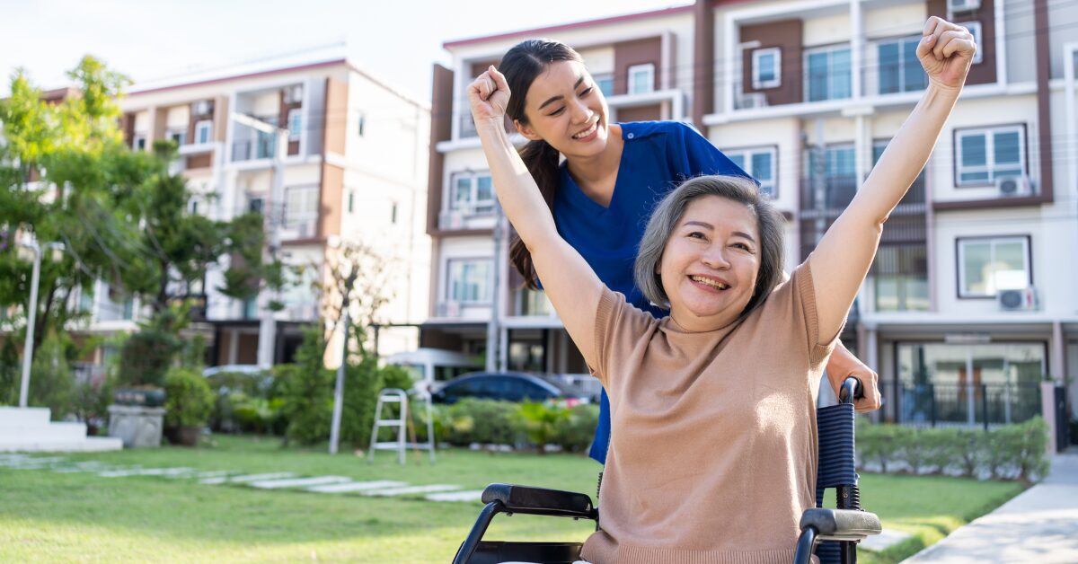a senior lady with her caregiver at assisted living