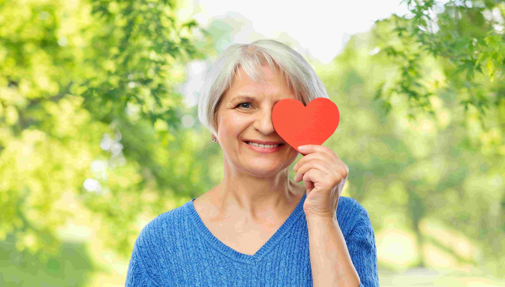 A senior woman promoting heart health.