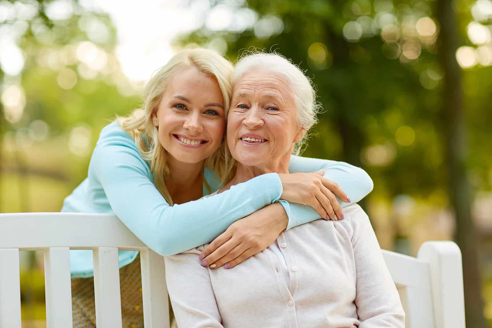 A senior woman and her adult child talking about the move to senior living.