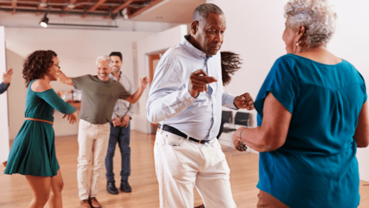 a group of seniors having fun in dance classes