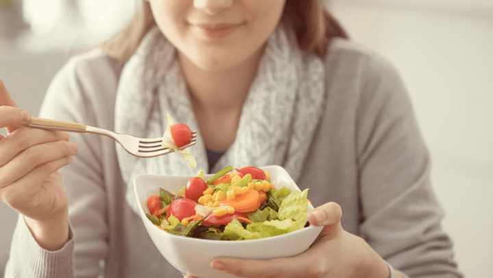 woman eating a salad
