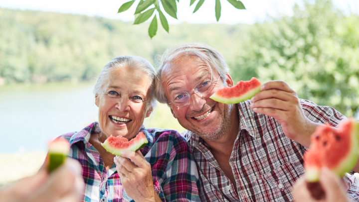 seniors eating watermelon