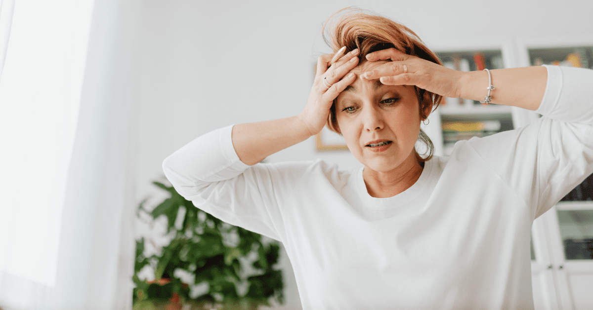 an old lady with headache