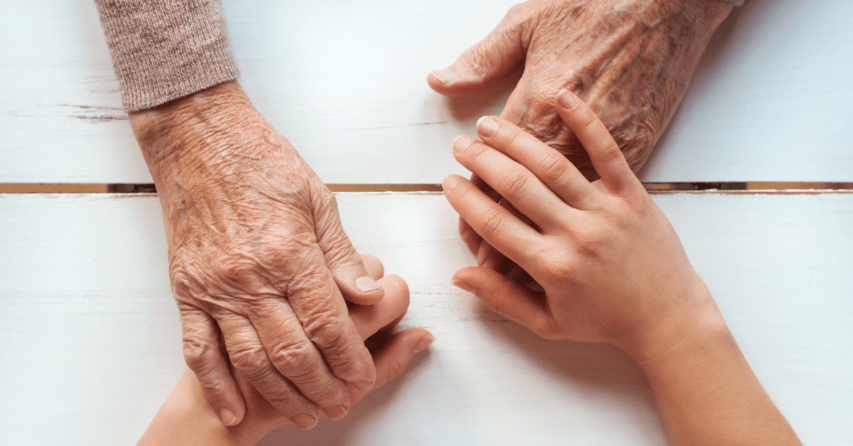 younger hands holding older ones