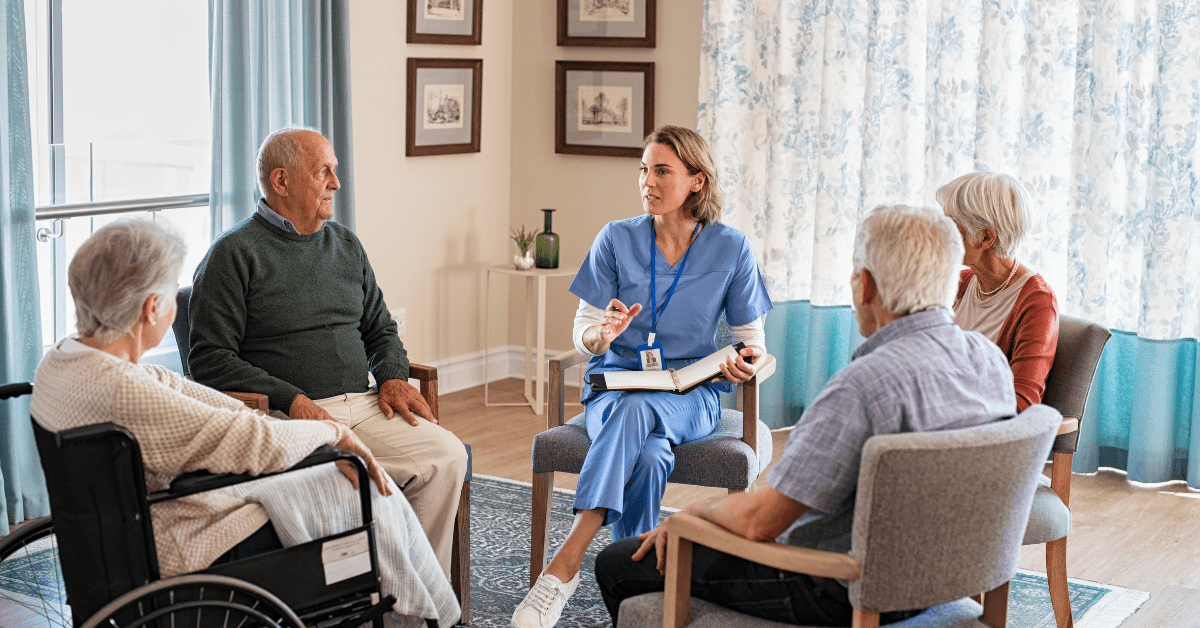 a group of seniors with caregiver