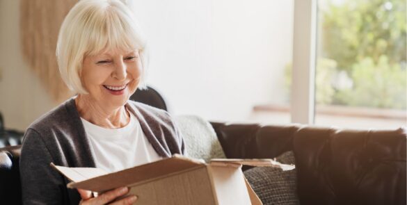 senior reading in memory care