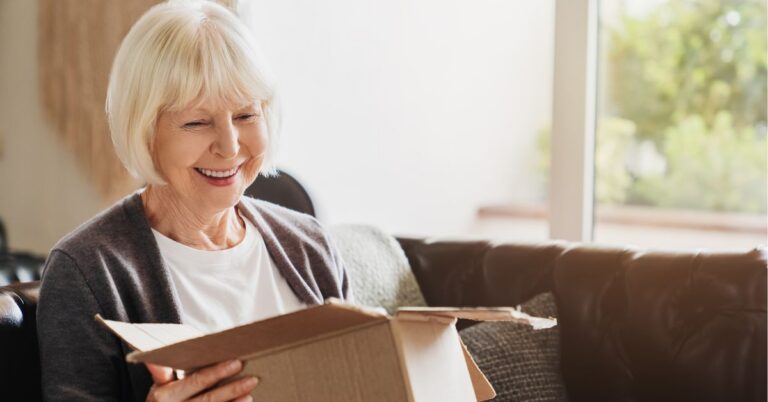 senior reading in memory care