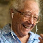 senior talking in the phone in alzheimer's care