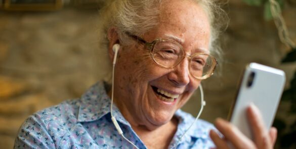 senior talking in the phone in alzheimer's care