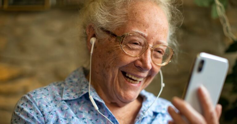 senior talking in the phone in alzheimer's care