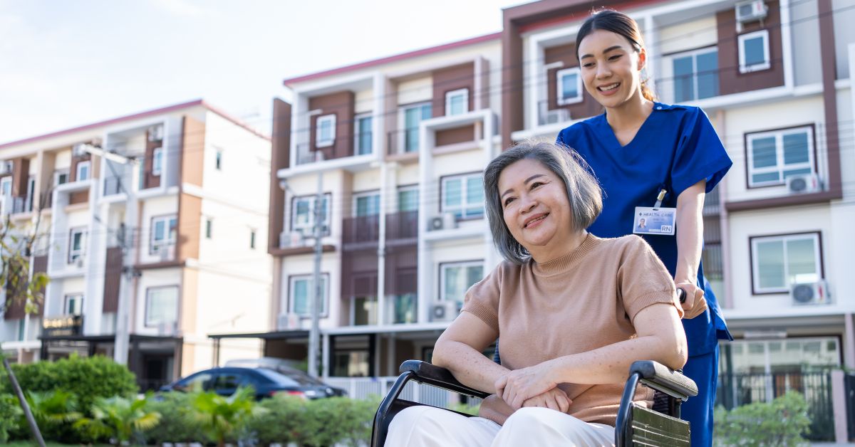 senior and caregiver in assisted living