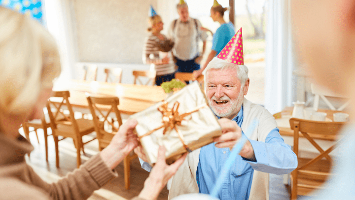 old man receiving a gift