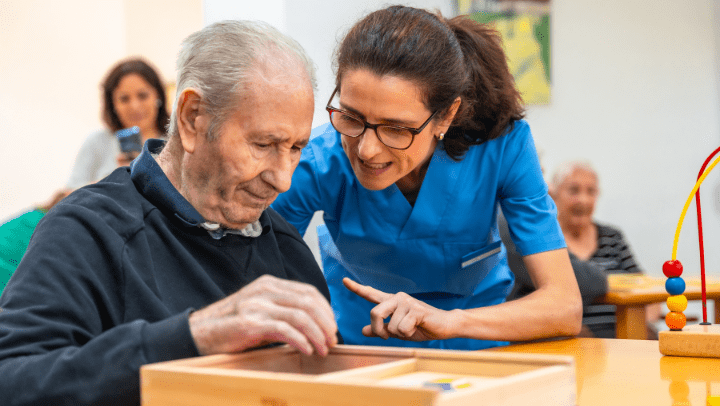 caregiver directing senior