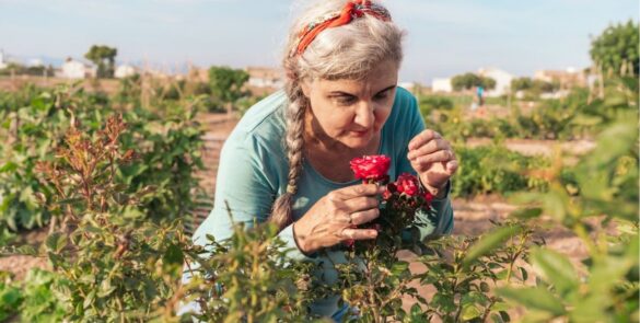 Older woman with flowers in a memory care