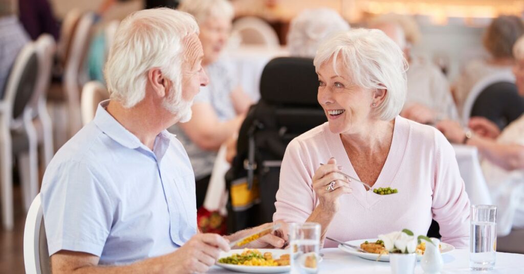 two seniors in an assisted living