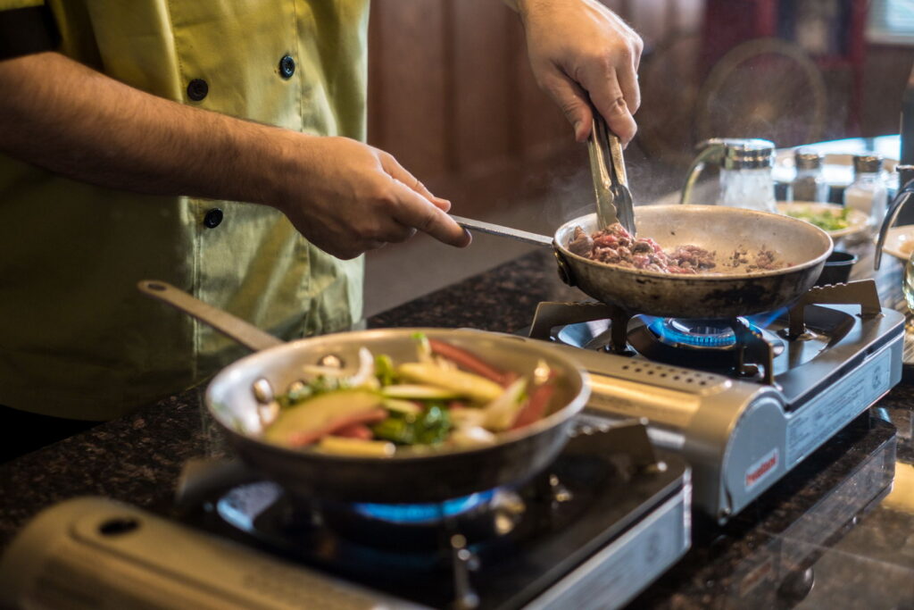 Seniors cooking in a senior living community