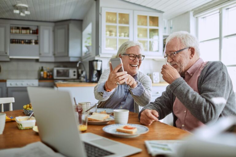 A couple enjoys a morning together in independent retirement living.