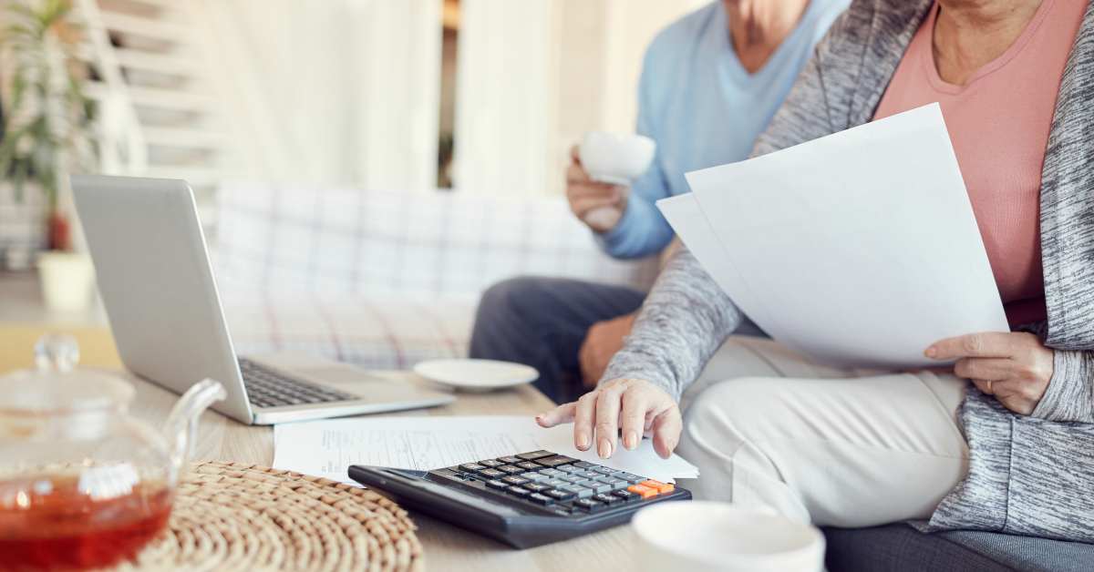 is it more expensive to stay at home or to move to assisted living