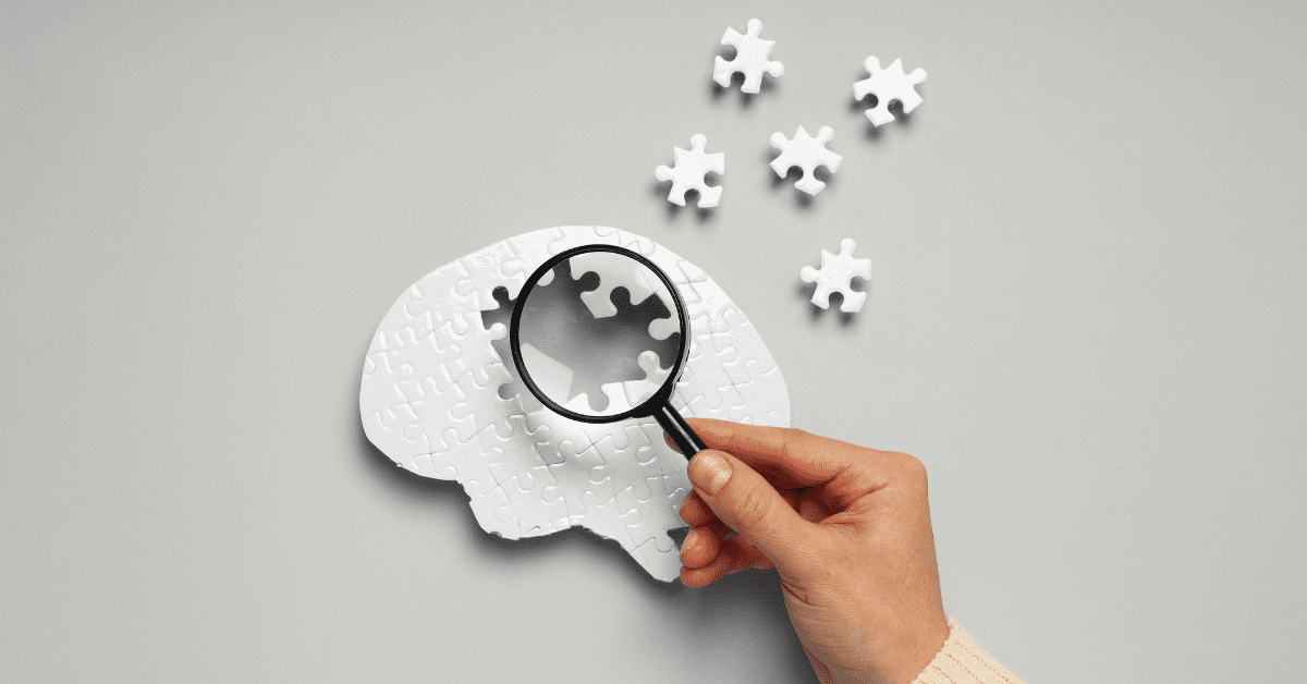 a brain puzzle with pieces coming off it