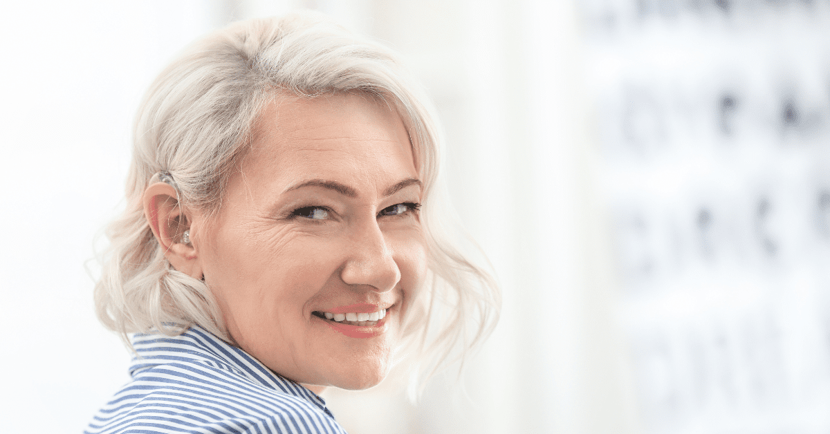 an old lady with a hearing device