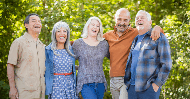 a group of happy seniors outside