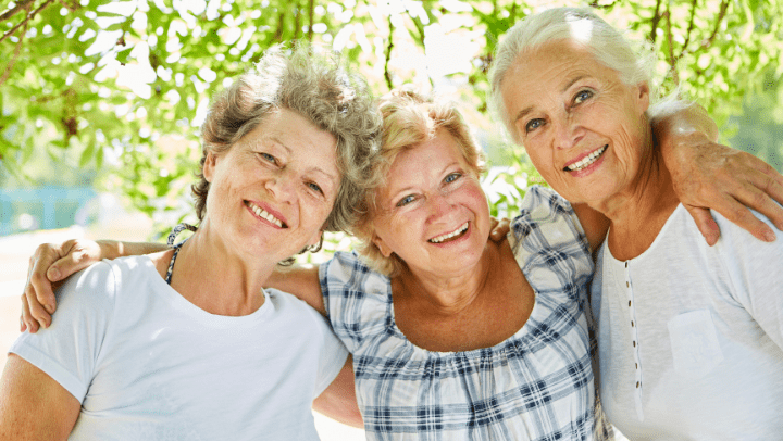ladies smiling together