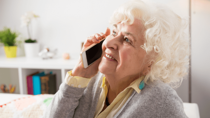 old woman talking through cell phone