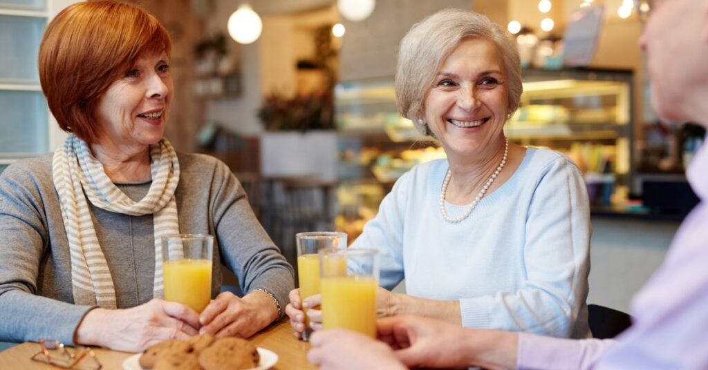 seniors happy and talking in the best assisted living facility