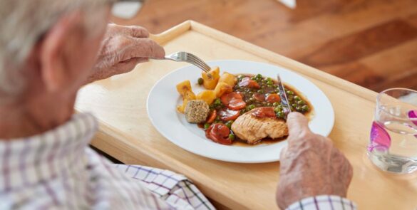 seniors meal in memory care communities
