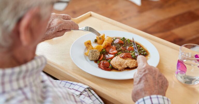 seniors meal in memory care communities