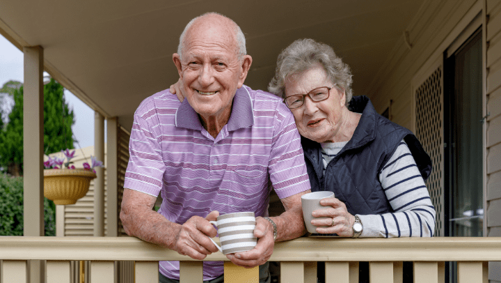 a senior couple having a coffee together