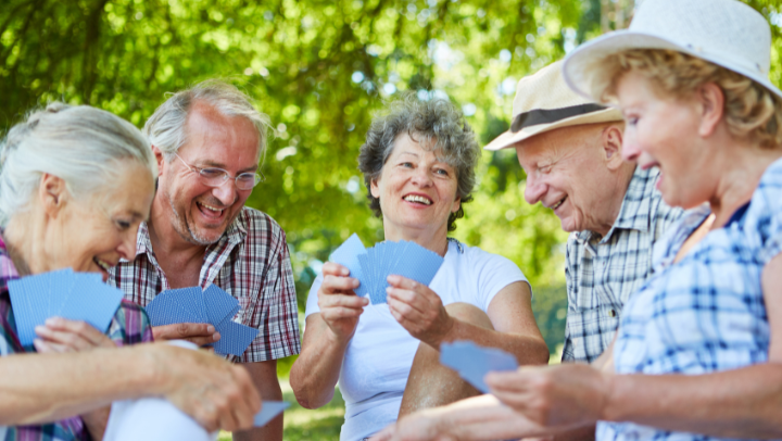 seniors playing with cards