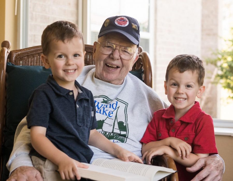 Senior woman with her grandchildren in a retirement community
